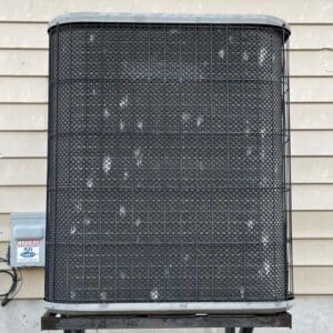 4 Hail damage on a St. Louis area air conditioner.