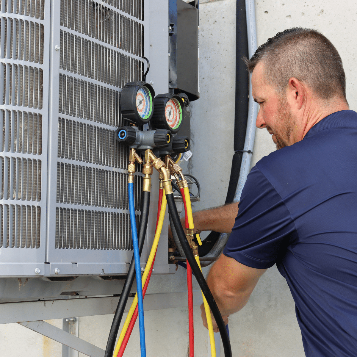 Ac services technician servicing AC unit