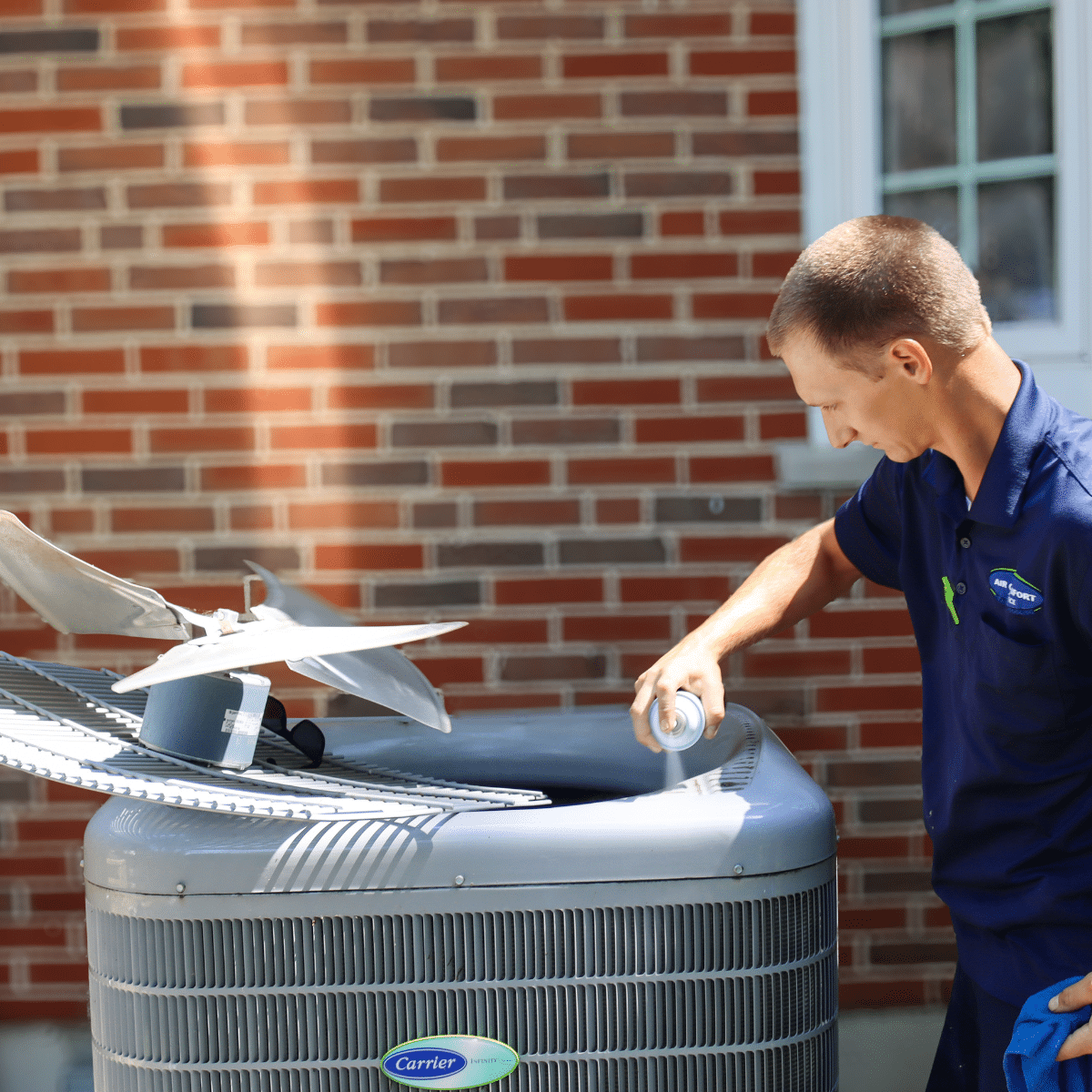 ac services technician performing maintenance on PPP customer ac unit
